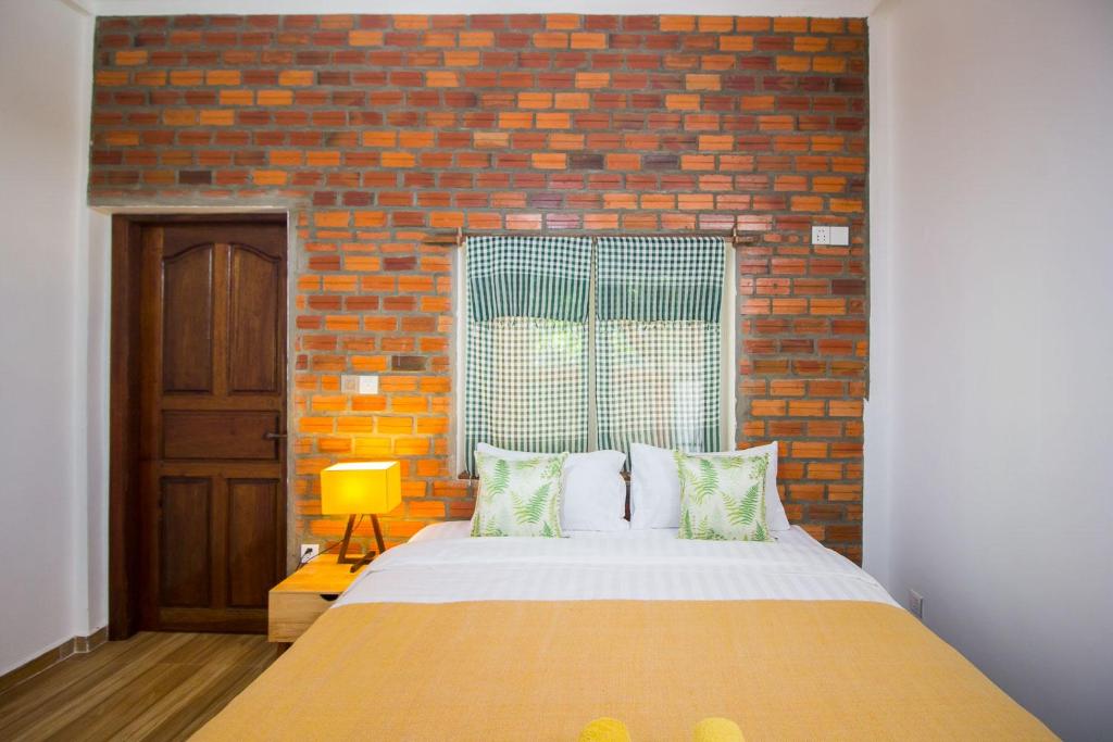 Postel nebo postele na pokoji v ubytování ANGKOR DINO HOME