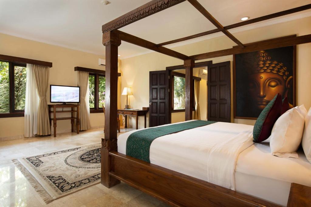 Postel nebo postele na pokoji v ubytování Ayung Resort Ubud