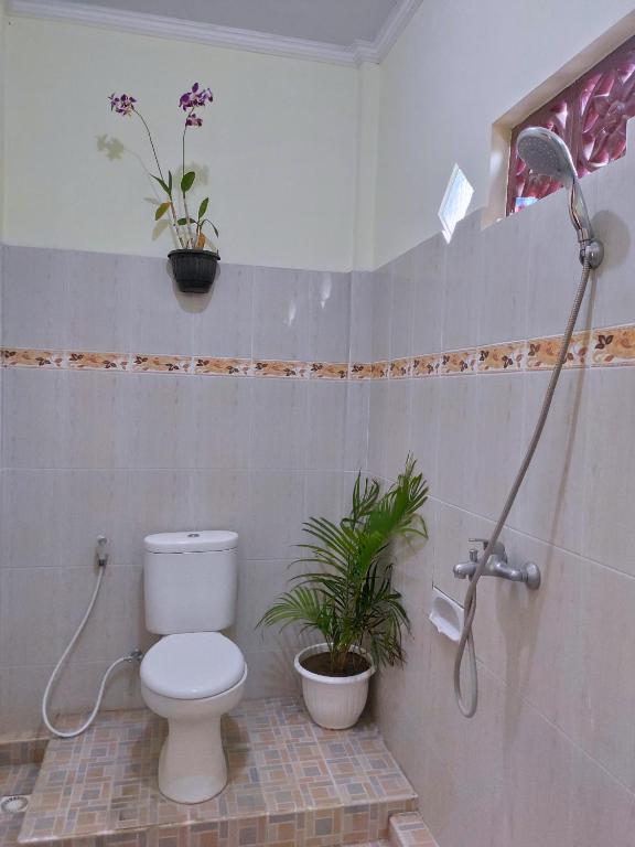 Koupelna v ubytování Gusti Rai House