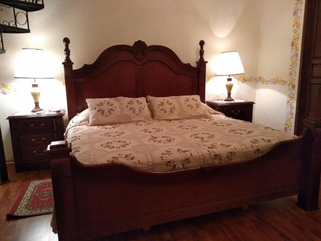 Postel nebo postele na pokoji v ubytování Hotel Spa Hacienda Real la Nogalera
