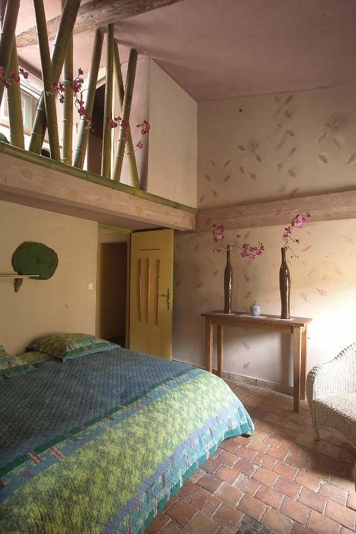 Postel nebo postele na pokoji v ubytování Demeure de Digoine "Chambre d'Hotes"