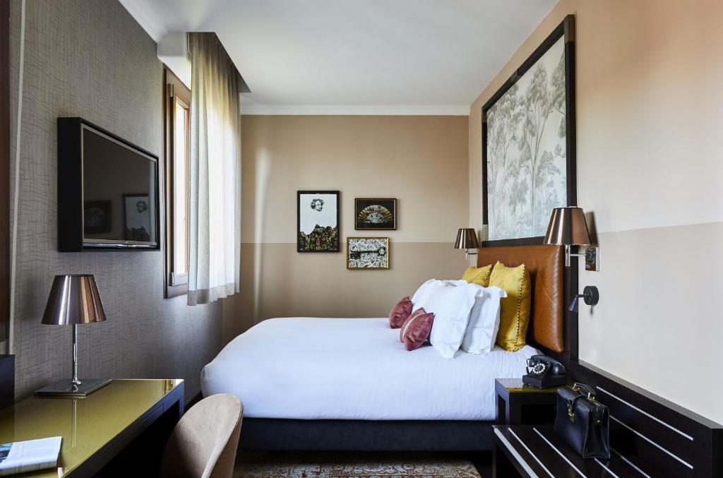 Postel nebo postele na pokoji v ubytování Hotel Indigo Venice - Sant'Elena by IHG