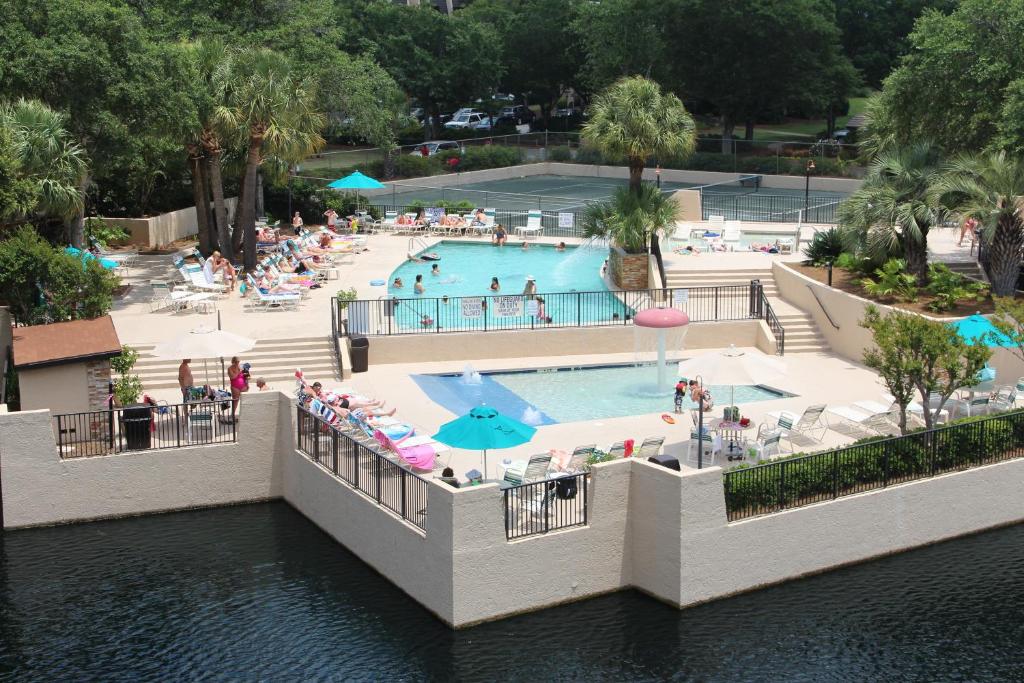 an overhead view of a pool at a resort at Seawatch at Island Club by Capital Vacations in Hilton Head Island