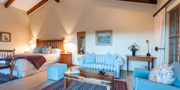 Postel nebo postele na pokoji v ubytování Lupus Den Country House B&B