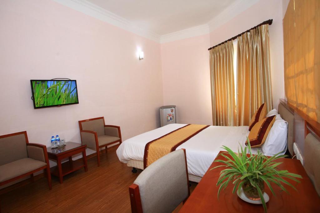 TV a/nebo společenská místnost v ubytování ATS Hotel