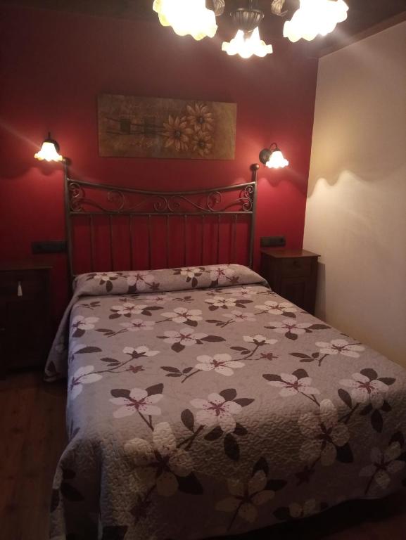 Postel nebo postele na pokoji v ubytování CASA RURAL LA MONTESINA