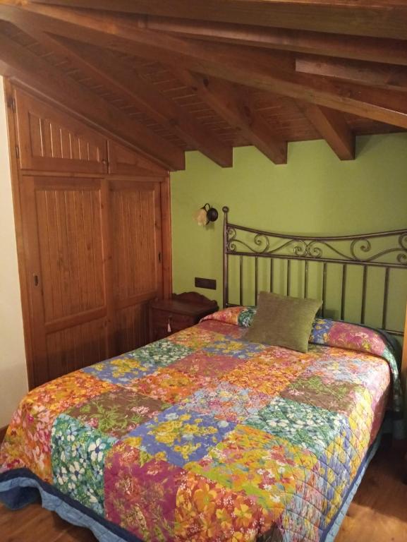 Postel nebo postele na pokoji v ubytování CASA RURAL LA MONTESINA