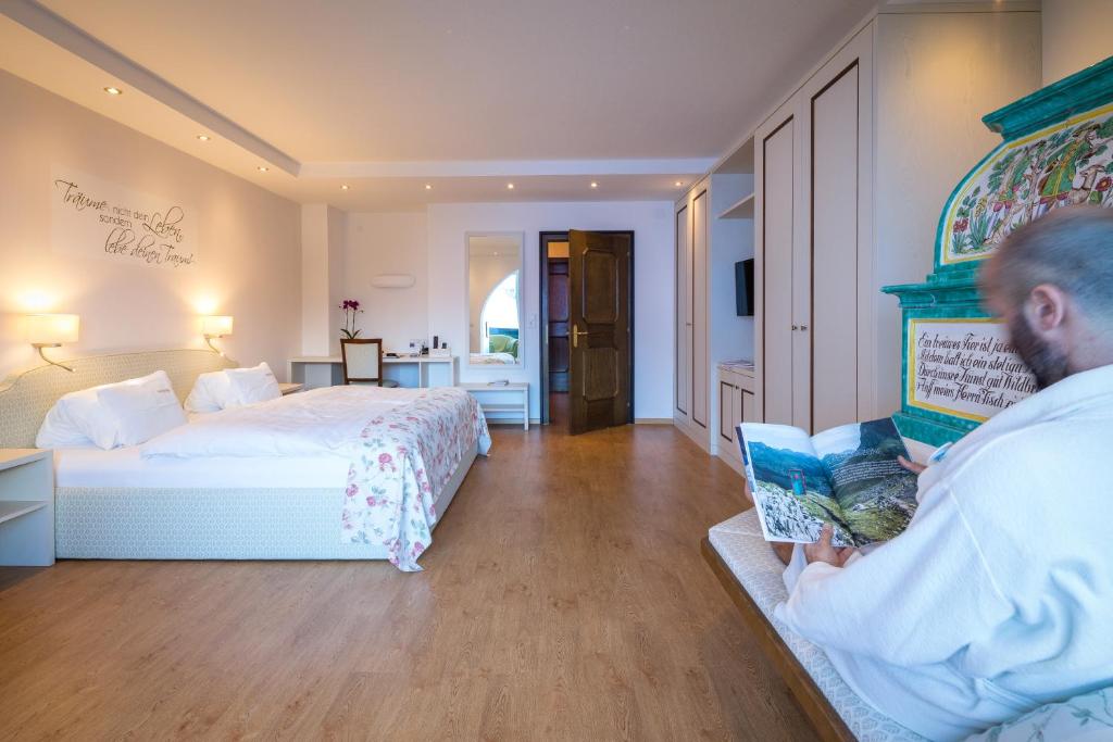 Postel nebo postele na pokoji v ubytování Hotel Albona Nova