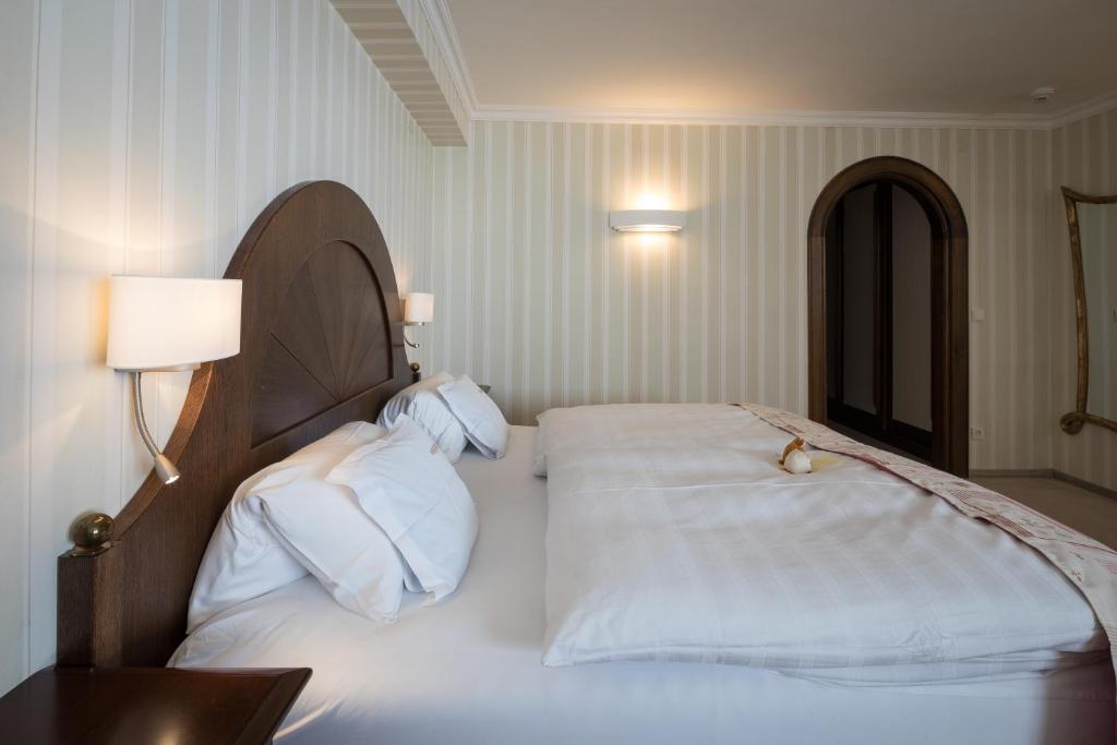 Postel nebo postele na pokoji v ubytování Hotel Albona Nova