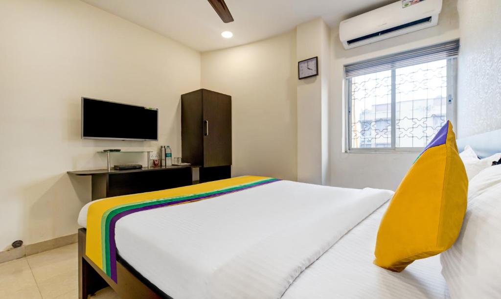 Postel nebo postele na pokoji v ubytování Itsy Hotels Neeranand Plaza