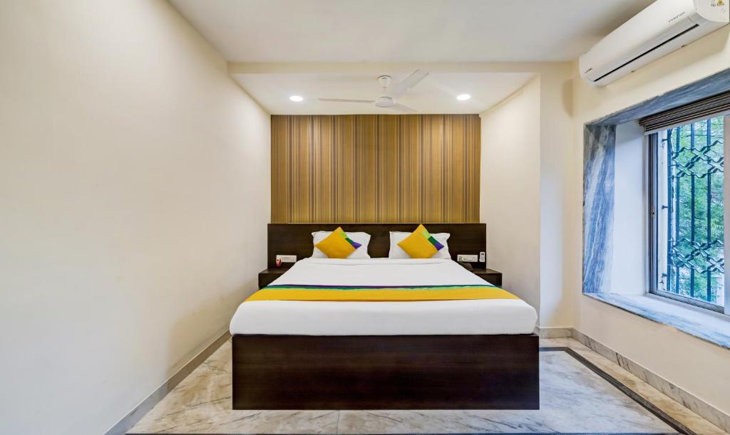 Postel nebo postele na pokoji v ubytování Itsy Hotels Neeranand Plaza