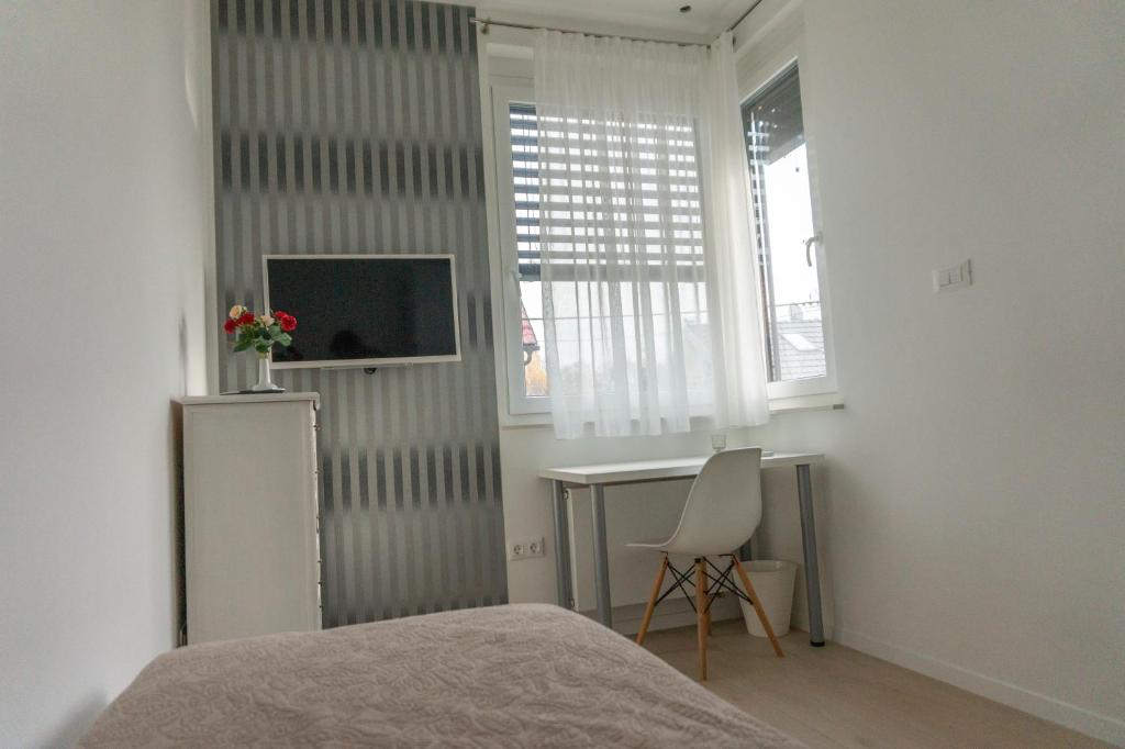 Televízia a/alebo spoločenská miestnosť v ubytovaní Apartment Maksimir Yard Zagreb