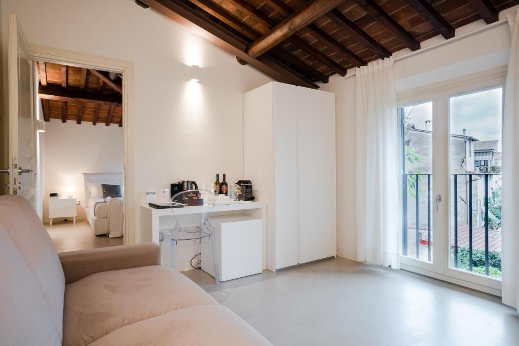 Kuchyň nebo kuchyňský kout v ubytování Palazzo Cini Luxury Rooms in Pisa