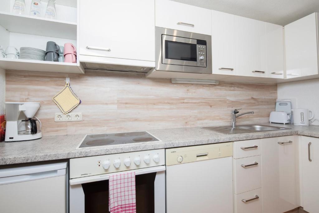 Kuchyň nebo kuchyňský kout v ubytování Ferienwohnung Lechner