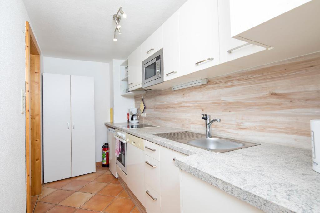 Kuchyň nebo kuchyňský kout v ubytování Ferienwohnung Lechner