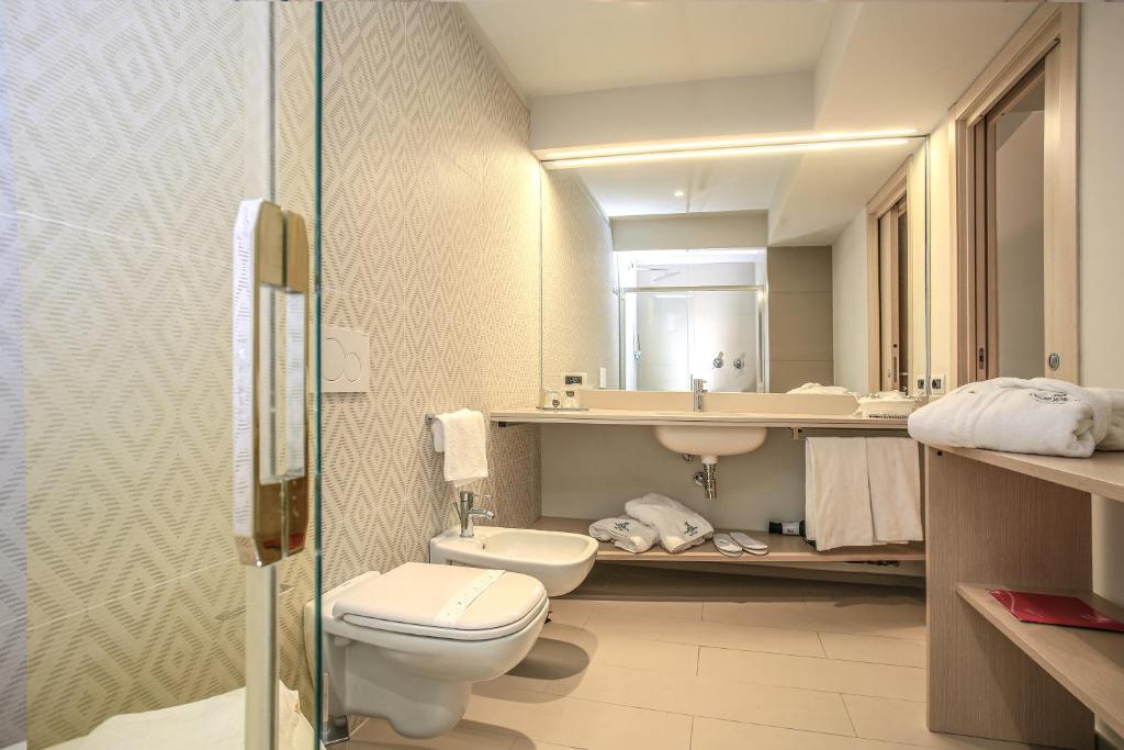 Een badkamer bij Hotel Corte Rosada