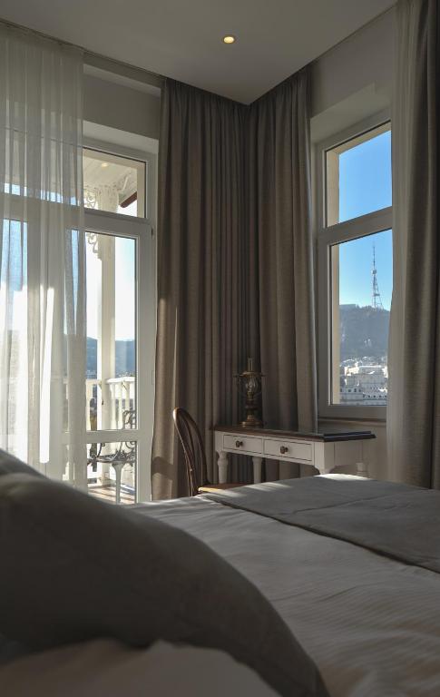 Postel nebo postele na pokoji v ubytování Hotel Passport Tbilisi