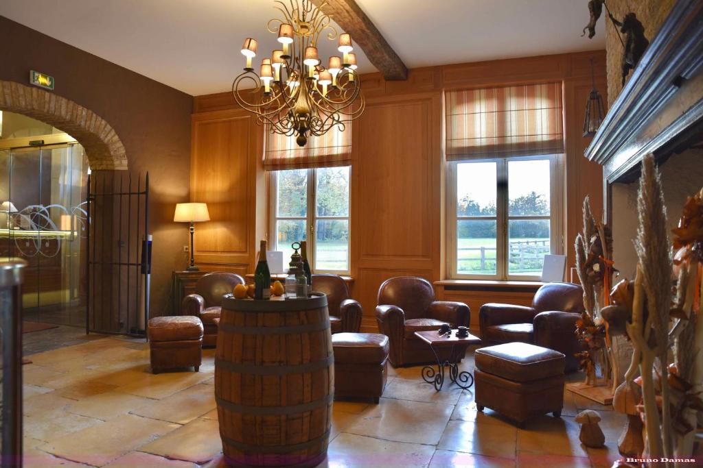 Posezení v ubytování Château De Cocove