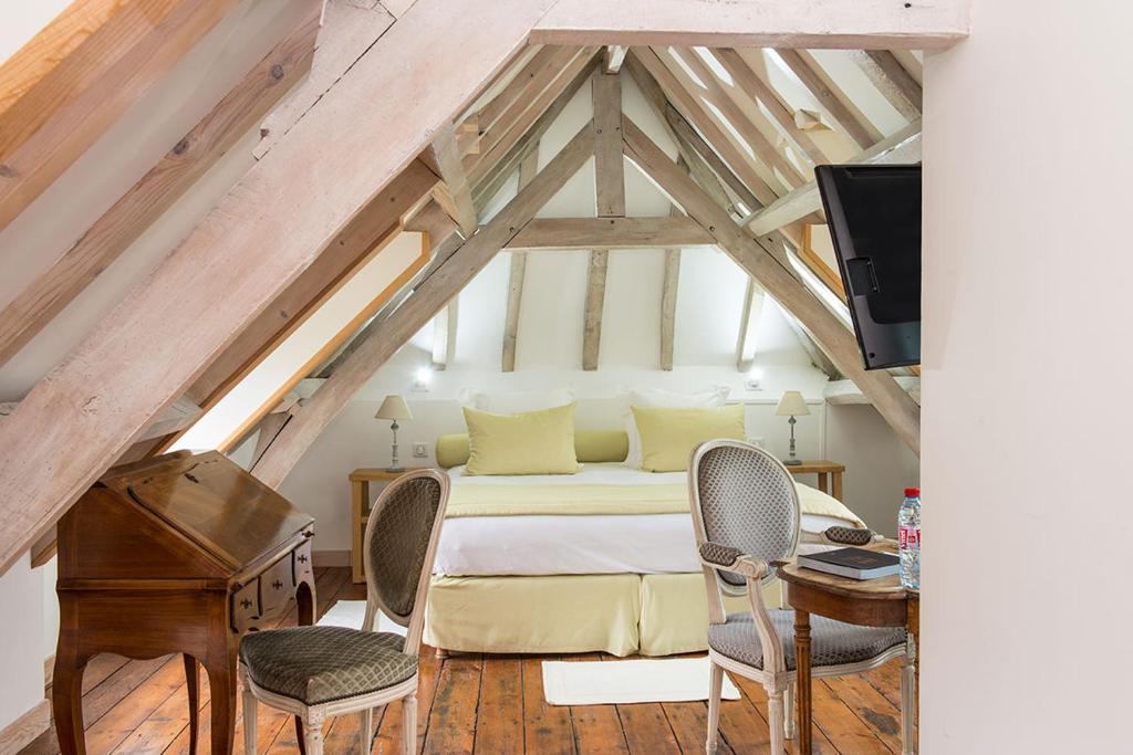 Posezení v ubytování Château De Cocove