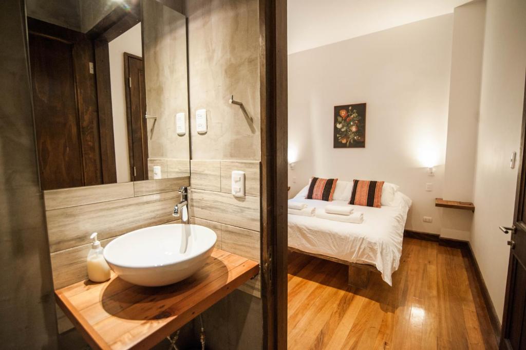 Postel nebo postele na pokoji v ubytování Casa California Guesthouse