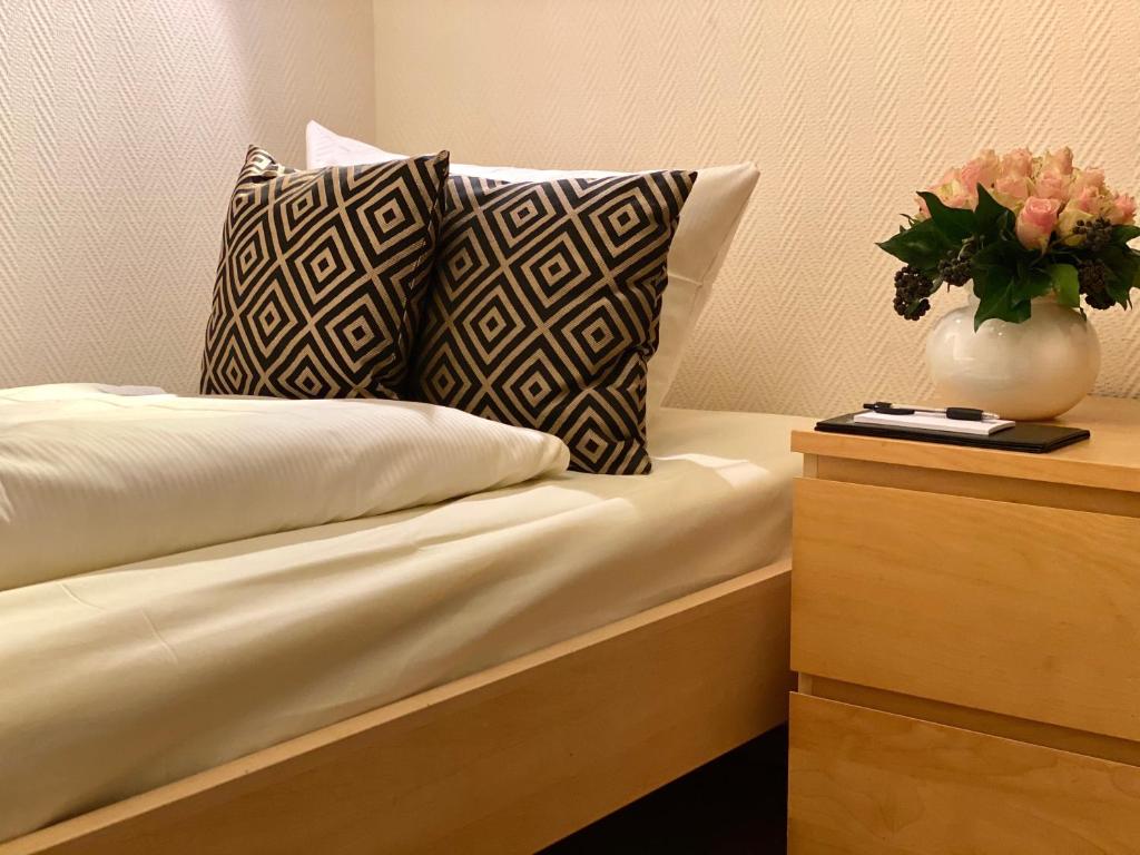 Postel nebo postele na pokoji v ubytování Hotel Arena Rooms - Berlin Mitte