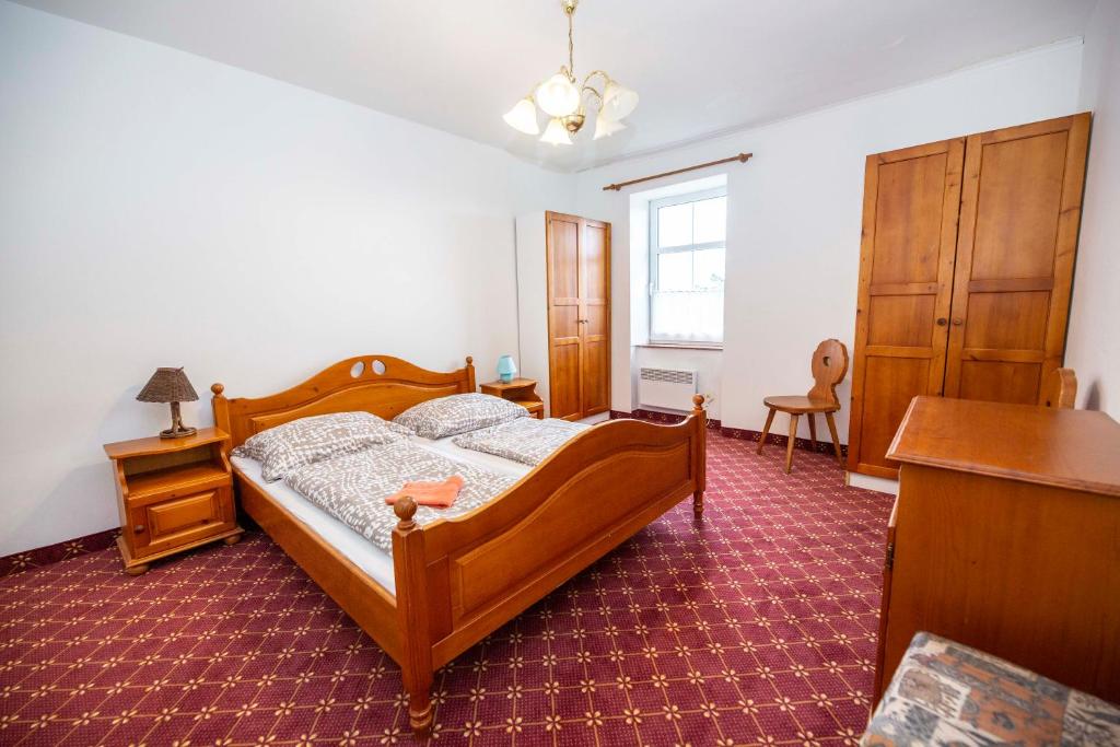 Postel nebo postele na pokoji v ubytování Hotel Svaty Hubert