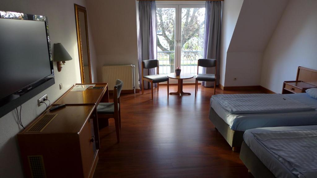 TV a/nebo společenská místnost v ubytování Hotel Heidpark