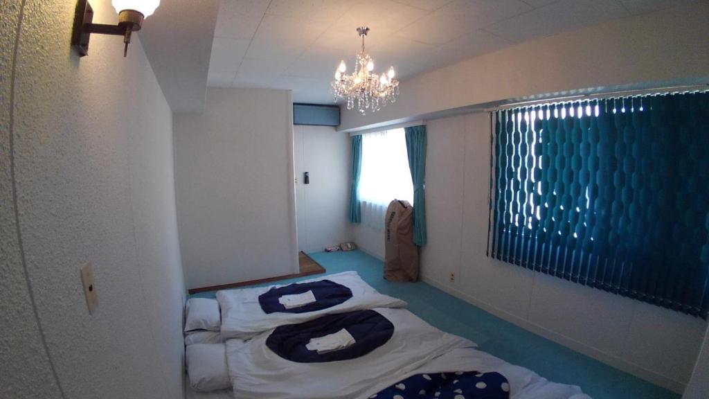Krevet ili kreveti u jedinici u objektu Setouchi Triennale Hotel 301Art1 Female dormitory - Vacation STAY 61583