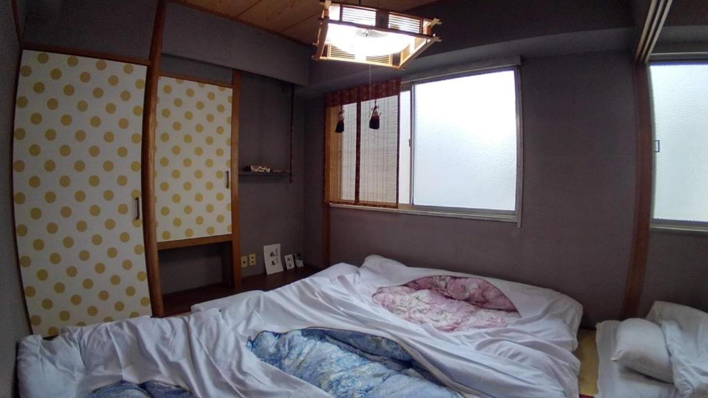 Postel nebo postele na pokoji v ubytování Setouchi Triennale Hotel 203 Japanese style Art / Vacation STAY 61564