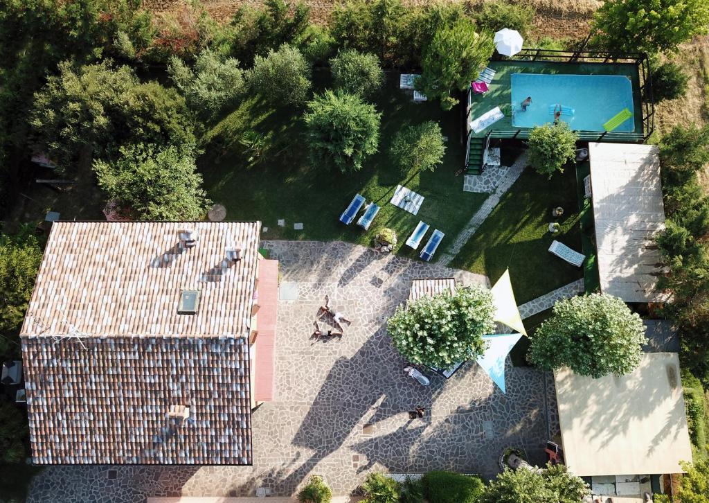 an overhead view of a house with a swimming pool at B&B Da Betta in Savio di Ravenna