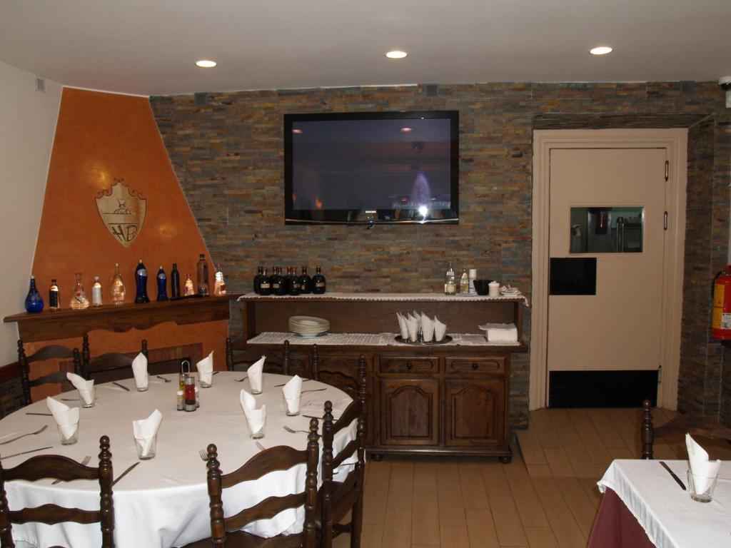 TV a/nebo společenská místnost v ubytování Hostal Barnes