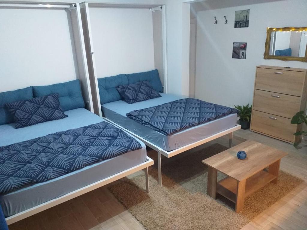 Postel nebo postele na pokoji v ubytování Skadarska Blue