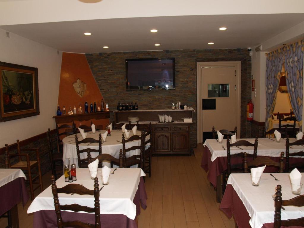 TV a/nebo společenská místnost v ubytování Hostal Barnes