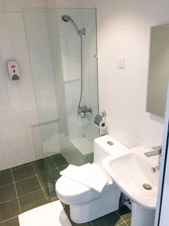 Koupelna v ubytování Citi Hotel