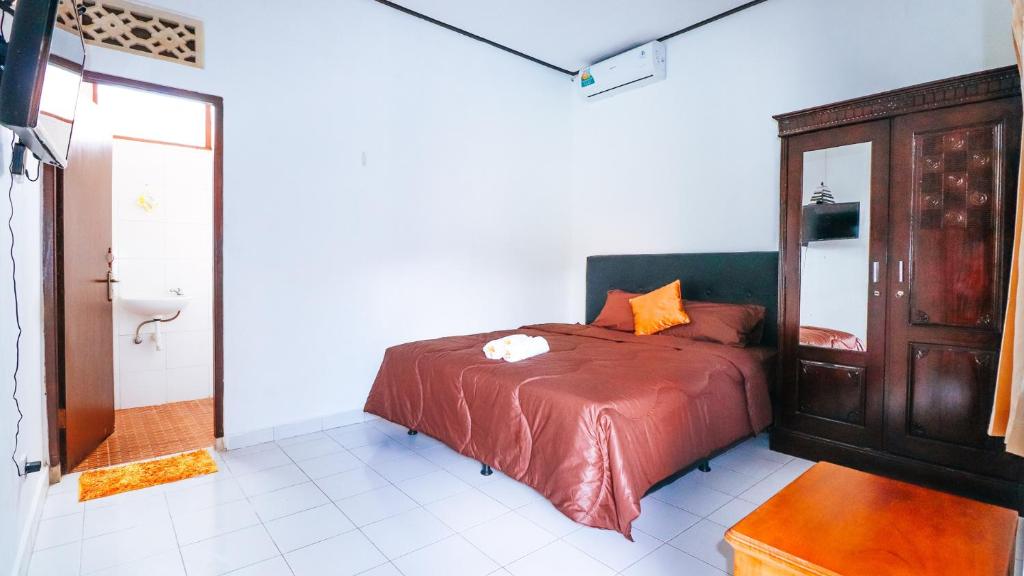 Postel nebo postele na pokoji v ubytování Mia Guest House