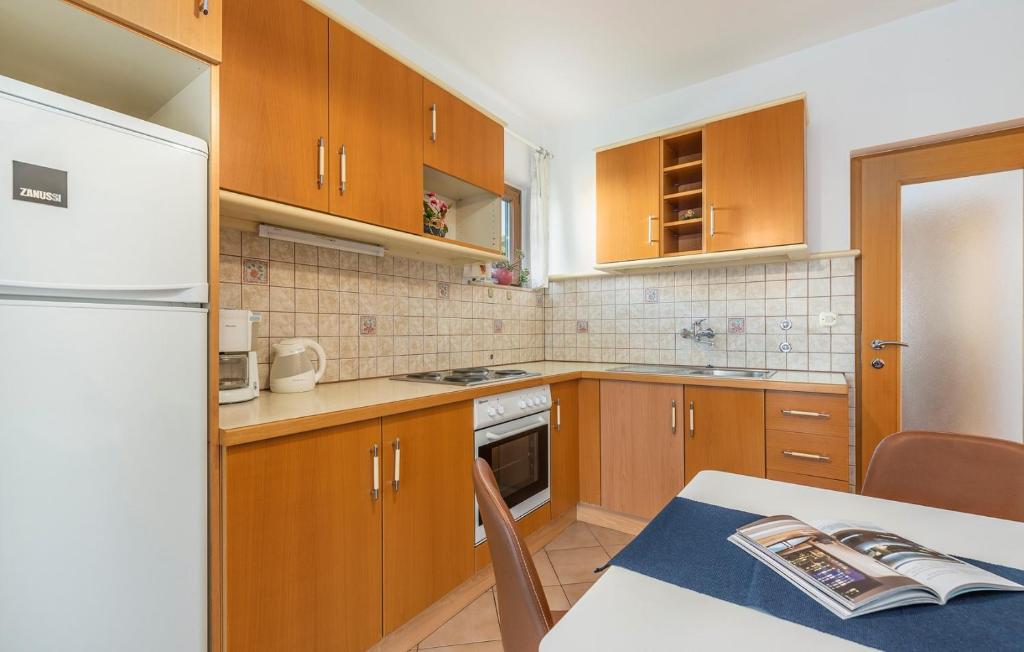 Kuchyň nebo kuchyňský kout v ubytování Apartment Complex Silvana
