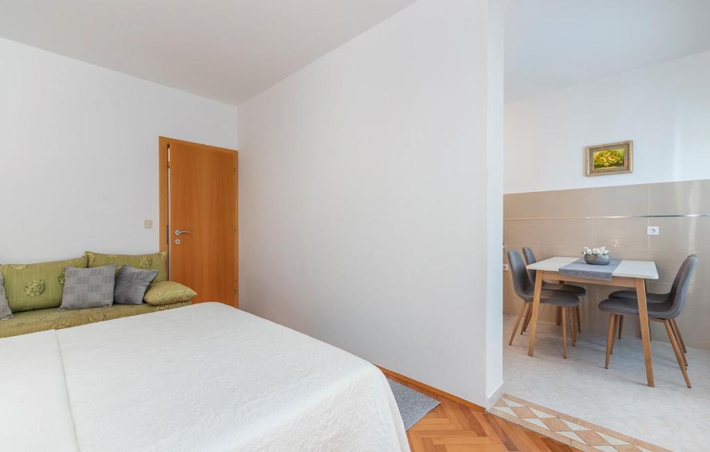 Postel nebo postele na pokoji v ubytování Apartment Complex Silvana