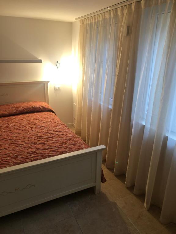 Posteľ alebo postele v izbe v ubytovaní B&B La Terrazza