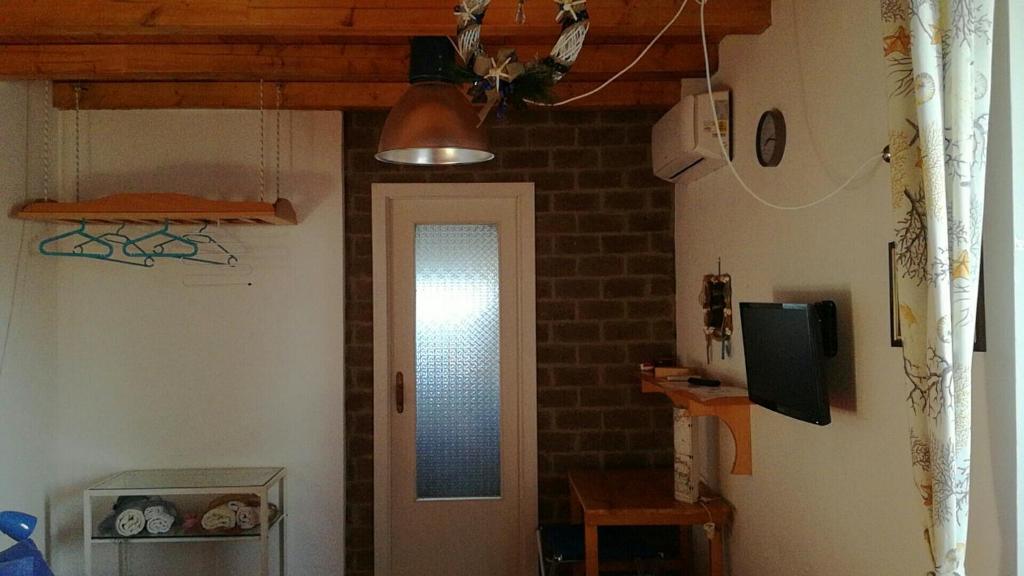 Telewizja i/lub zestaw kina domowego w obiekcie B&B PompeiLog