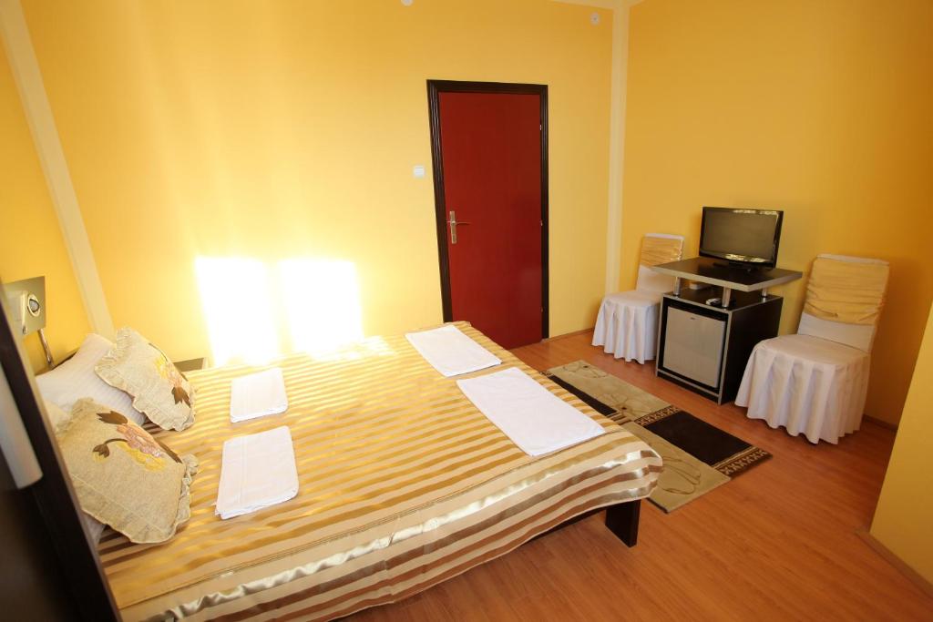 Postel nebo postele na pokoji v ubytování Villa Atina
