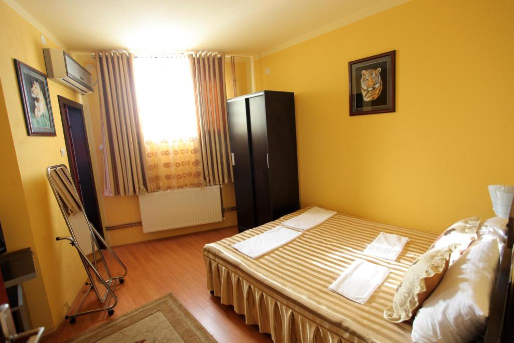 Postel nebo postele na pokoji v ubytování Villa Atina