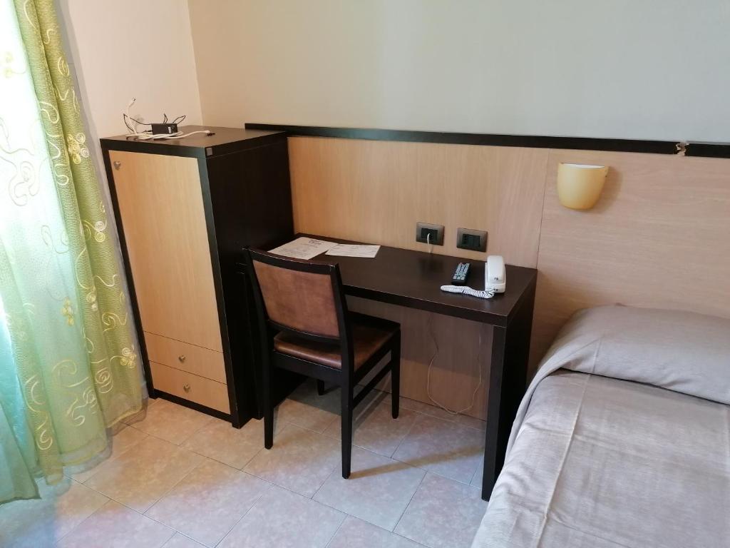 Postel nebo postele na pokoji v ubytování Hotel Cilene