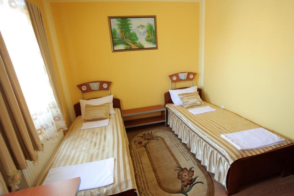 Postel nebo postele na pokoji v ubytování Villa Atina