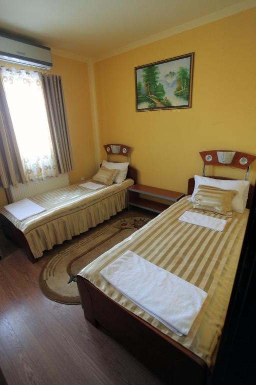 Postel nebo postele na pokoji v ubytování Villa Atina