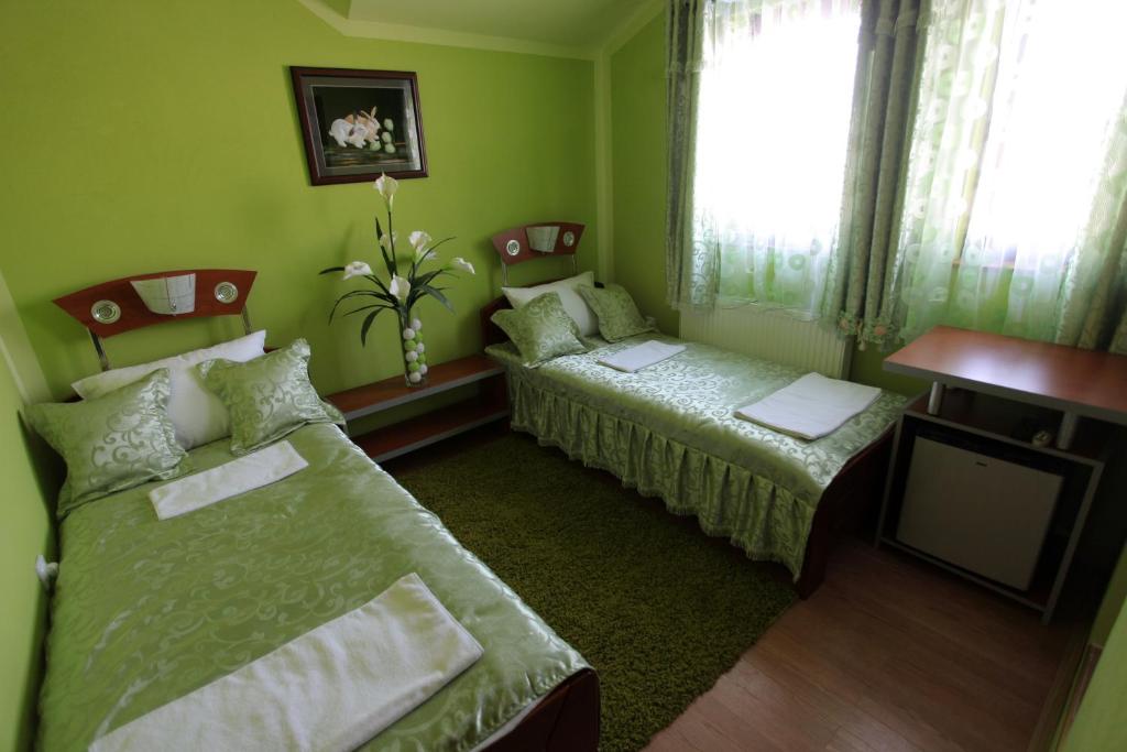 Postel nebo postele na pokoji v ubytování Villa Atina