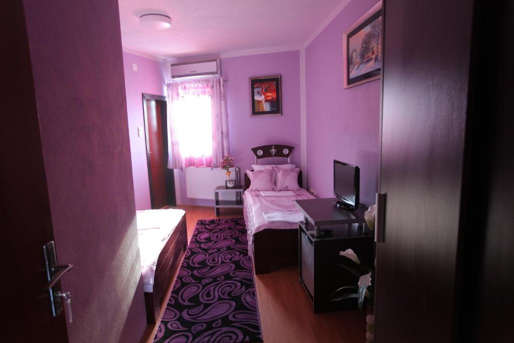 Postel nebo postele na pokoji v ubytování Villa Atina