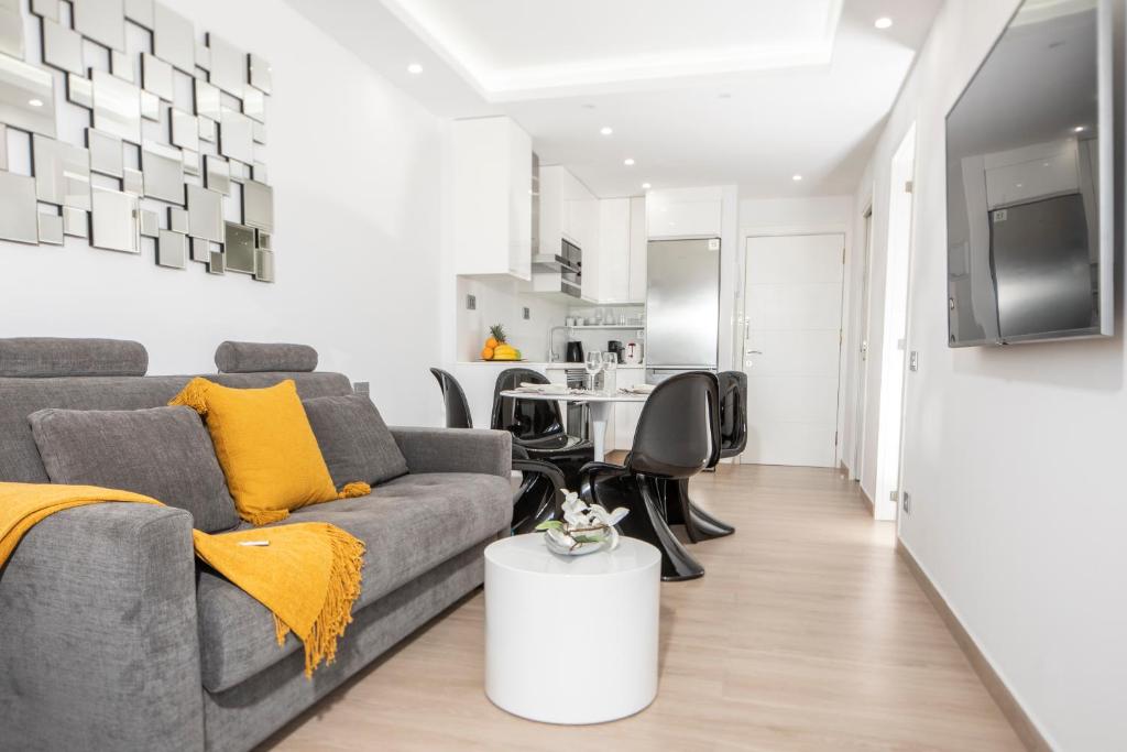 TV a/nebo společenská místnost v ubytování Luxury Apartment Boutique in Torres del Sol