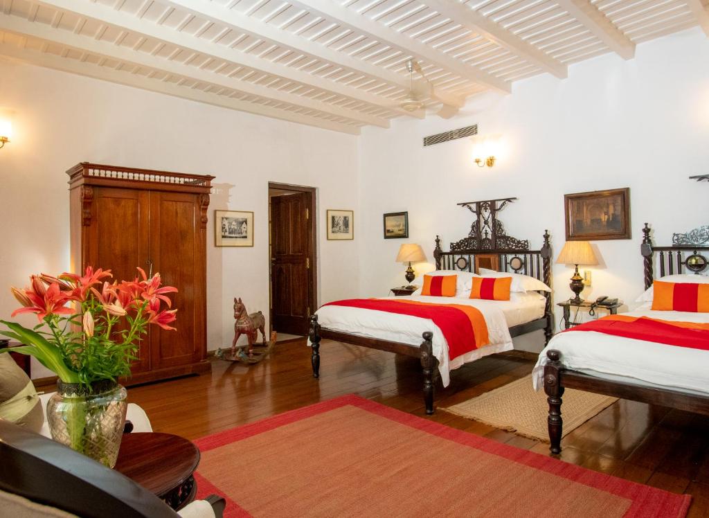 Postel nebo postele na pokoji v ubytování Le Colonial 1506 - Exclusive Luxury Hideaway
