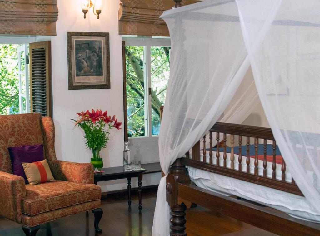 Posezení v ubytování Le Colonial 1506 - Exclusive Luxury Hideaway