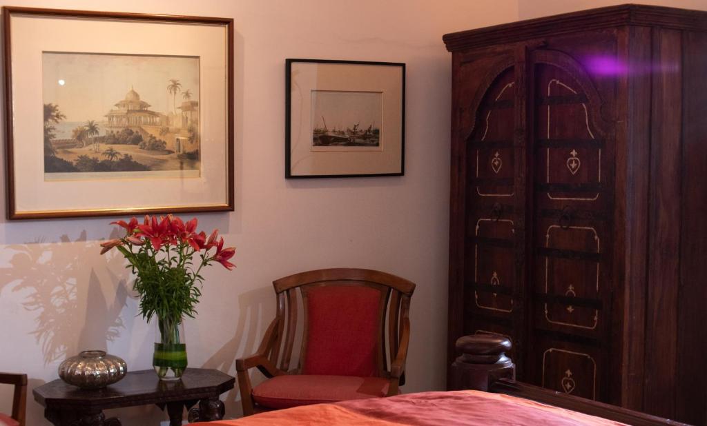 Postel nebo postele na pokoji v ubytování Le Colonial 1506 - Exclusive Luxury Hideaway